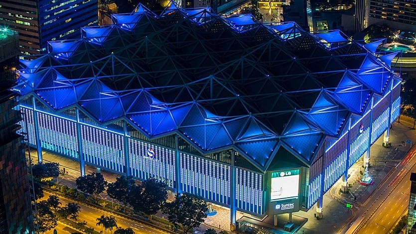 SNEF Event at Suntec Singapore, modern venue with blue lighting for conferences and exhibitions.