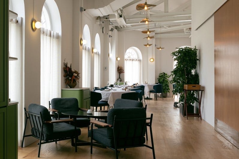 Alpine Room at Restaurant JAG: modern event space with natural light for meetings and gatherings.