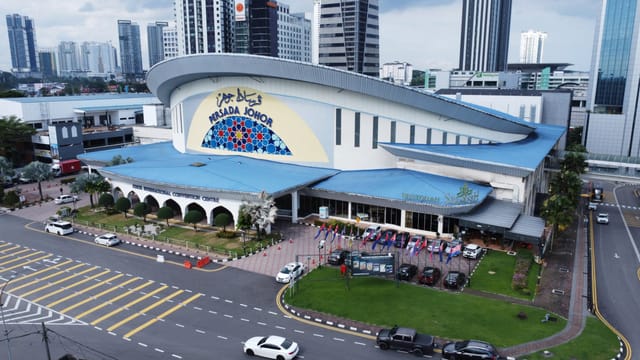 Modern convention center exterior at Persada Johor for large-scale events and meetings.