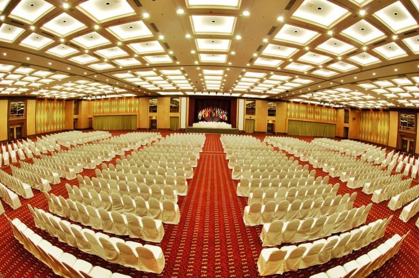 Spacious auditorium with elegant chairs, ideal for conferences and formal events.