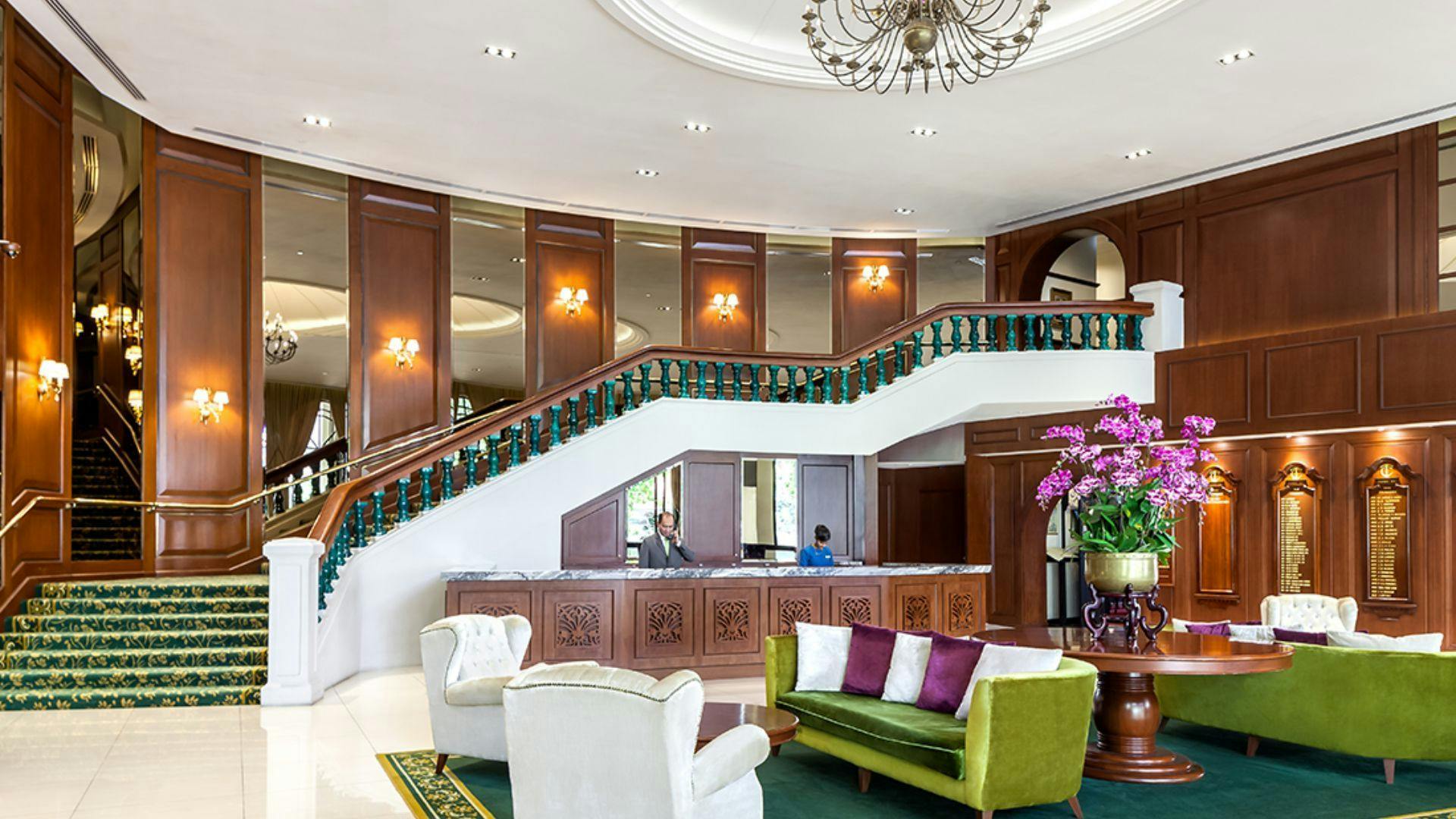 Terrace Bistro & Bar lobby with grand staircase, ideal for events and meetings.