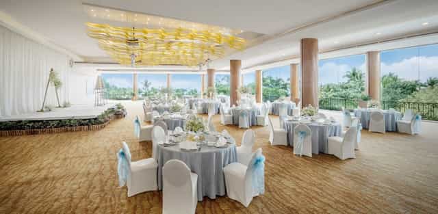 Wedding venue at Shangri-La Rasa Sentosa with elegant blue and white decor.