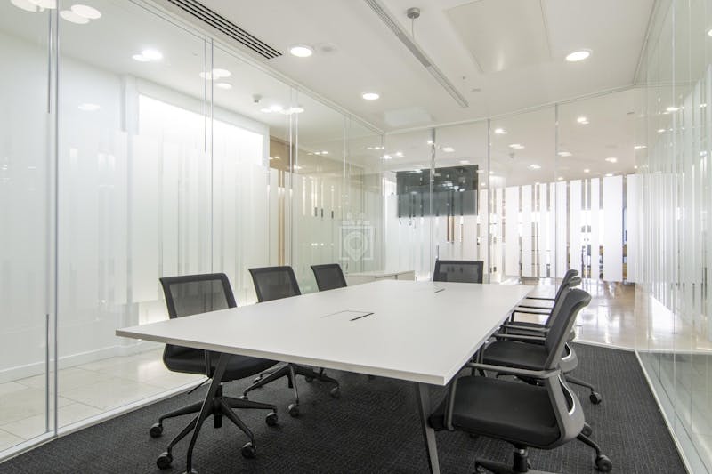 Modern glass-walled conference room in Virtual Offices, Canary Wharf for meetings and presentations.