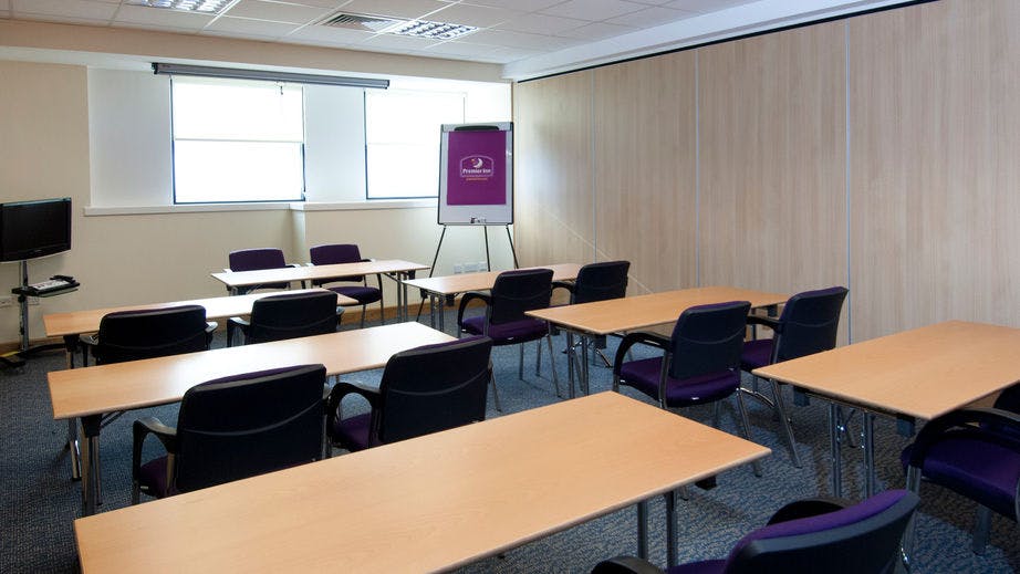 Meeting room in Premier Meetings Manchester, ideal for workshops and training sessions.