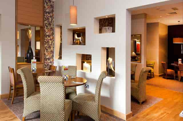 Cozy meeting space in Premier Meetings Manchester, perfect for professional events.