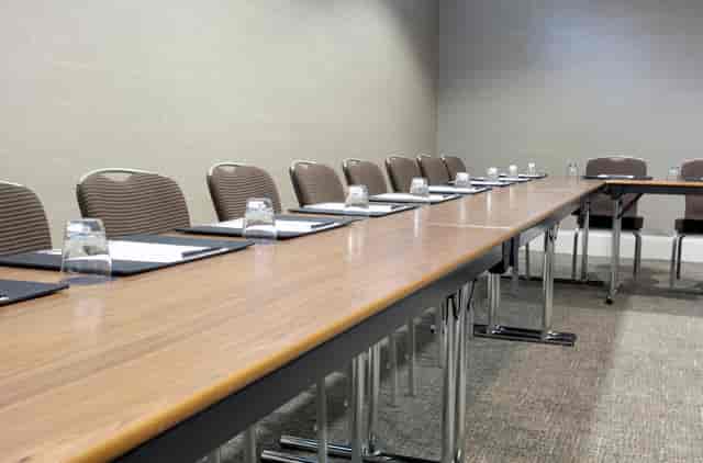 Holborn Suite meeting room with long table, ideal for professional gatherings and events.