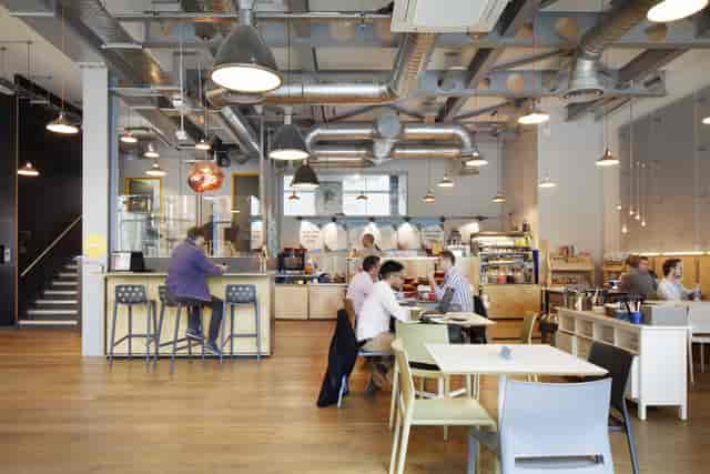 Modern open-concept café at Duplex Studios, perfect for networking events and meetings.