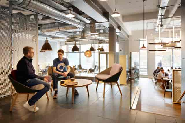 Modern open-concept meeting space at Duplex Studios for creative brainstorming sessions.