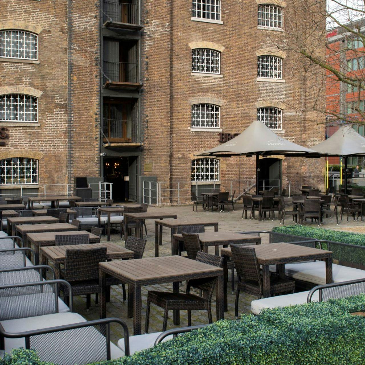 Cellar Bar terrace with rustic charm, perfect for networking events and casual receptions.