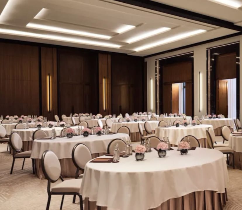Elegant Lana Ballroom with floral centerpieces, perfect for corporate events and banquets.