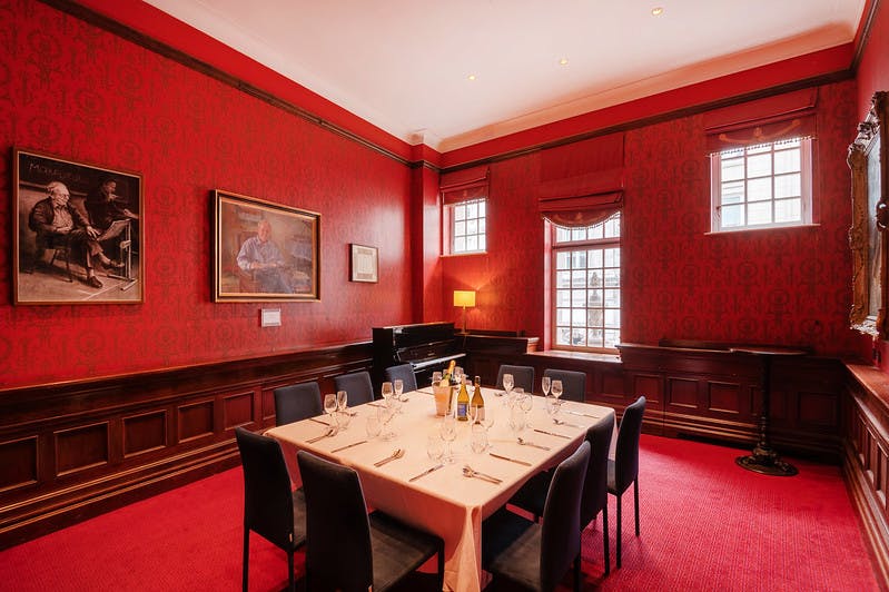 Ellis Room at London Coliseum: elegant red walls, ideal for private dining and meetings.