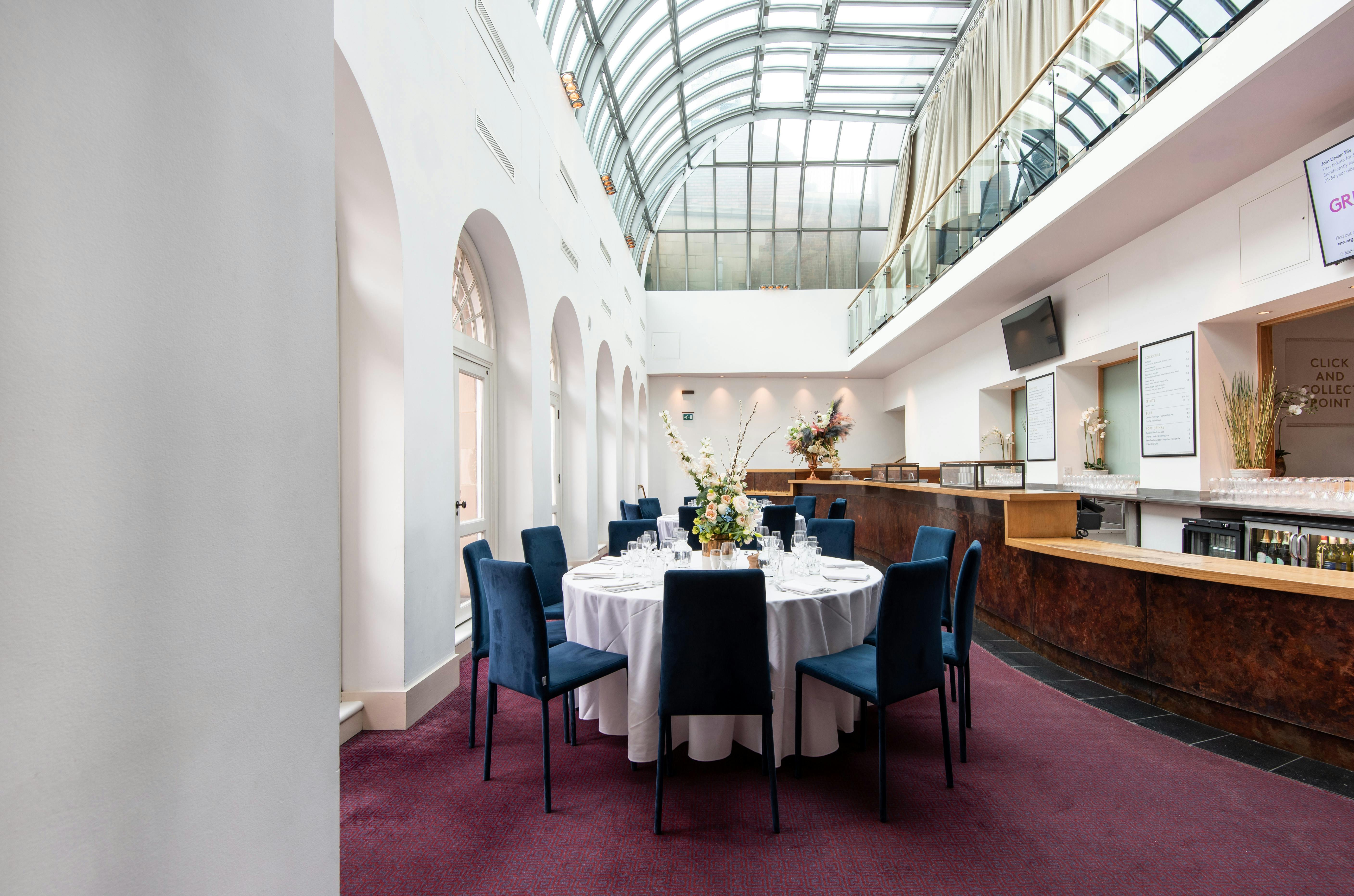 Sky Bar at London Coliseum: elegant round table, ideal for corporate events and gatherings.