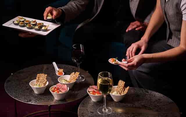 Elegant catering setup at Sky Bar, London Coliseum for sophisticated events and networking.