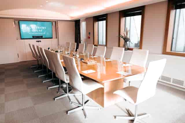 Executive boardroom in Surveyors House featuring ergonomic seating for professional meetings.