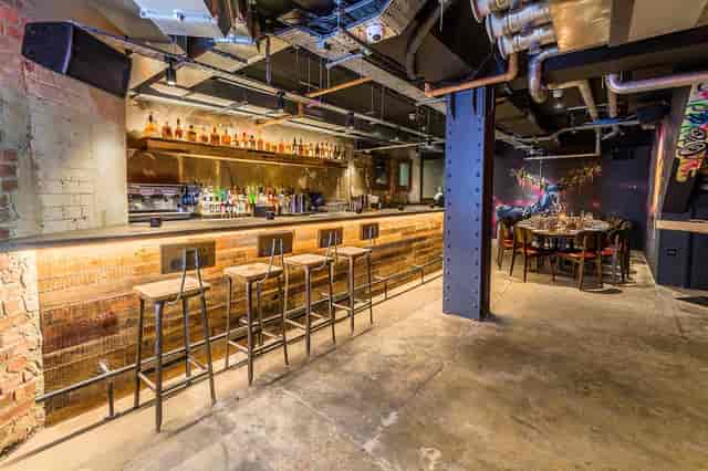 Hidden Heddon bar with high stools, perfect for networking events and private functions.