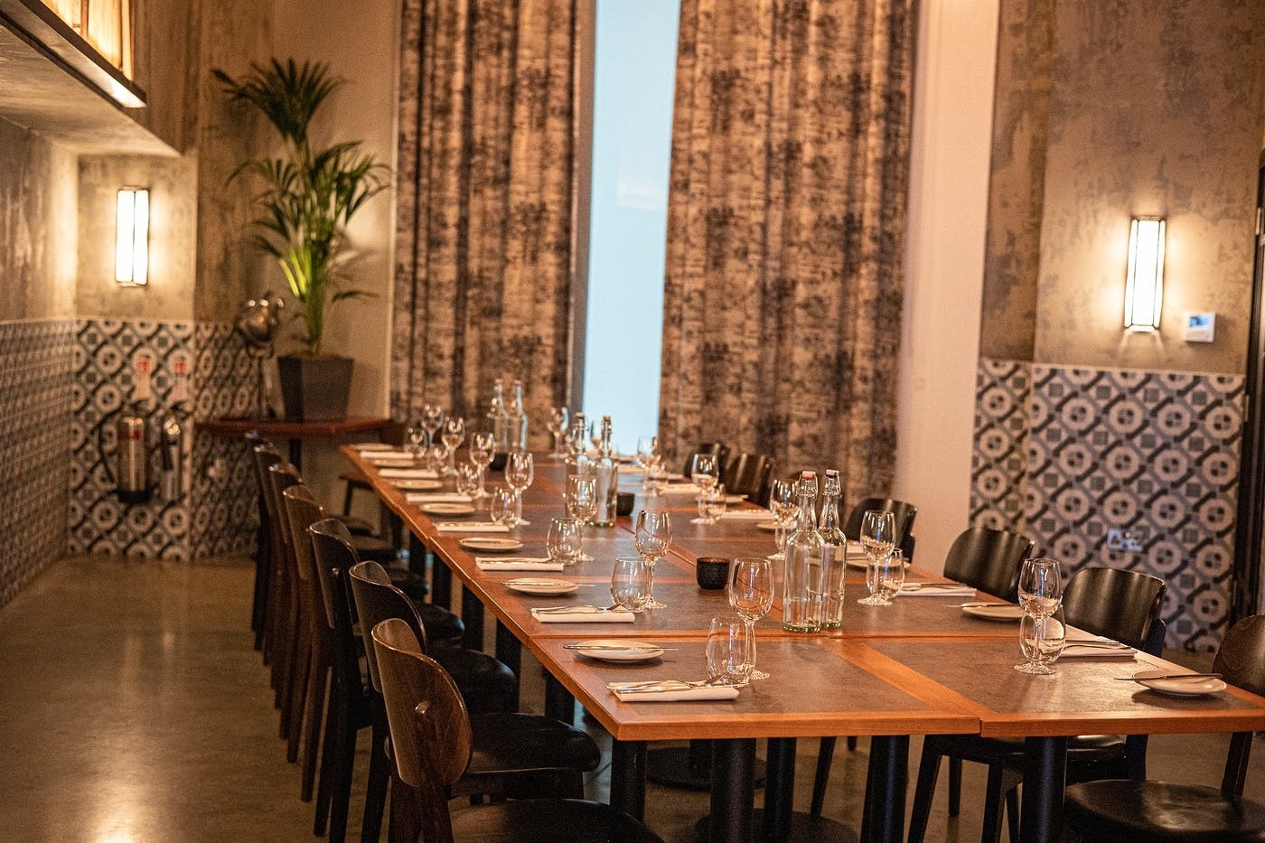 Private dining room at Bread Street Kitchen with elegant table setting for intimate events.