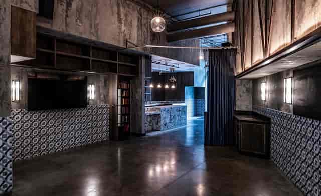 Private dining room at Bread Street Kitchen, featuring industrial-chic design for events.