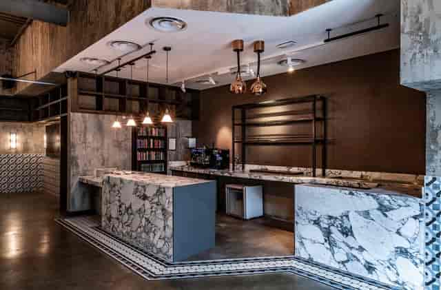 Private dining room at Bread Street Kitchen with marble countertops, ideal for events.