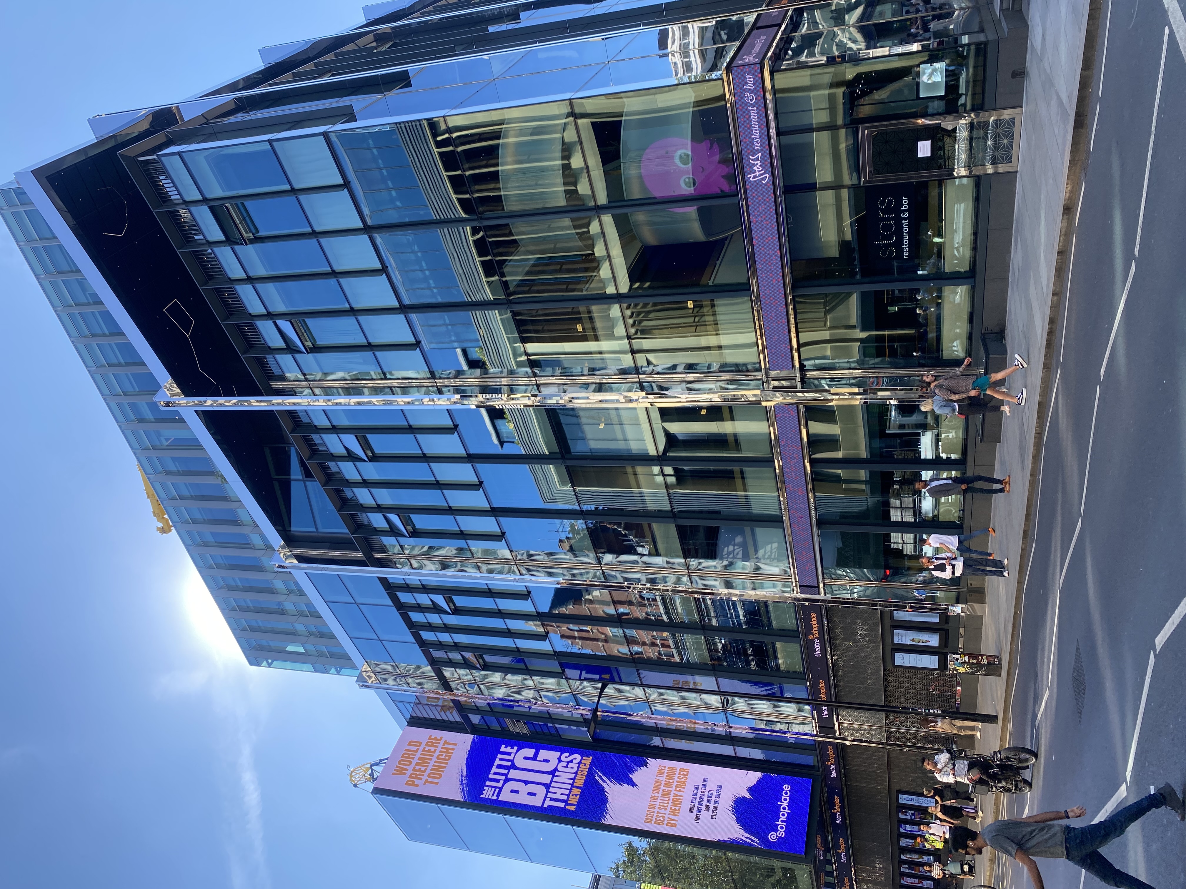 Sohoplace auditorium, modern glass facade, ideal for events and conferences. - Banner