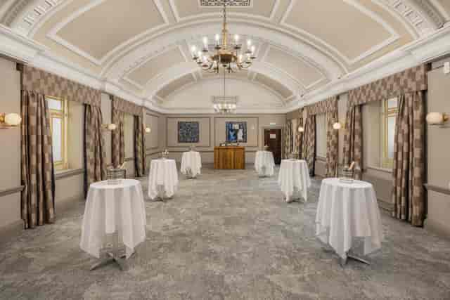 Ampthill Suite cocktail reception room with vaulted ceilings, ideal for elegant corporate events.