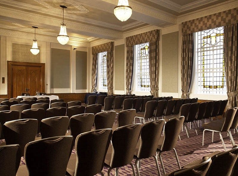 Cambria Suite meeting room with elegant decor, ideal for conferences and workshops.