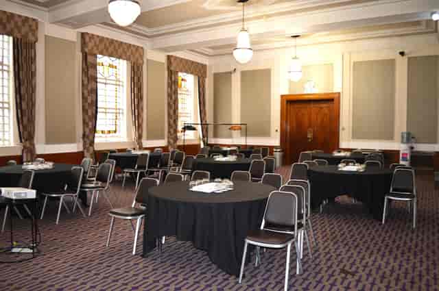 Cambria Suite ballroom with cabaret seating for corporate events and gala dinners.