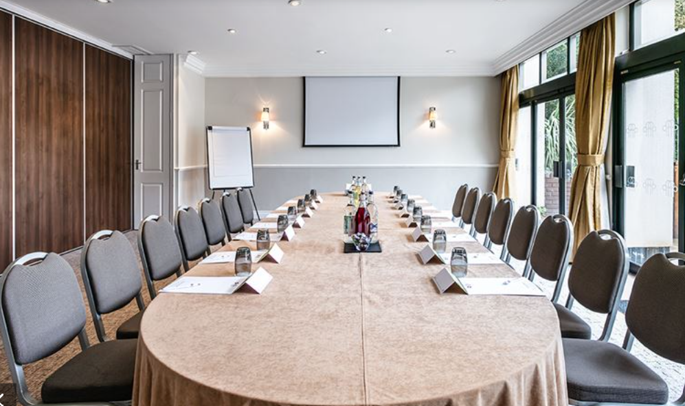 Conference room at Best Western Pinewood, set for professional meetings and presentations.