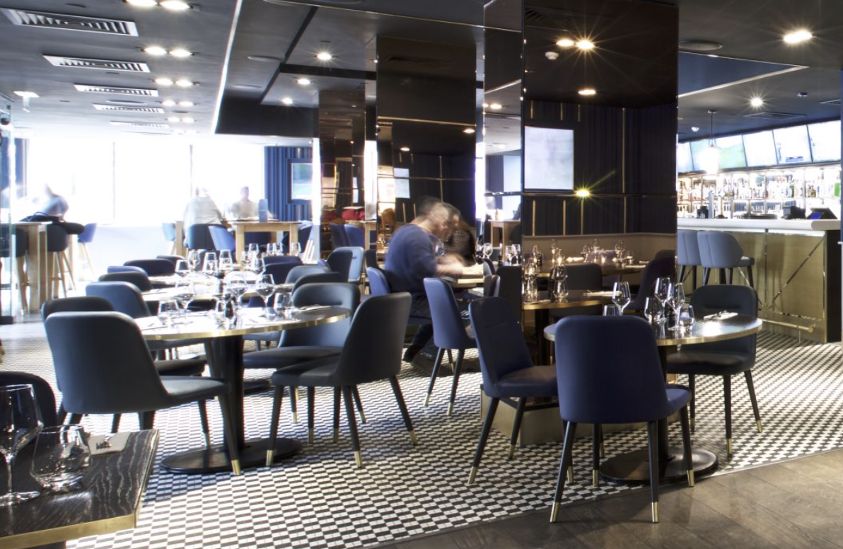 Private hire at Frankie's Sports Bar, featuring sleek furnishings for upscale events.