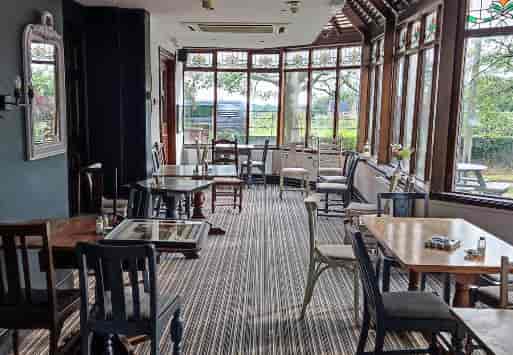 Charming venue at The Kilton Inn with natural light for intimate meetings and events.