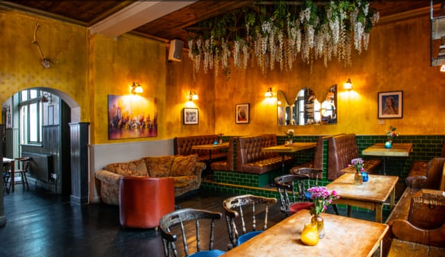 Charming venue with cozy seating for intimate gatherings and networking events.