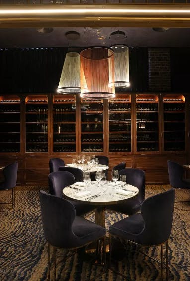 Elegant dining room in MAYA Manchester, perfect for corporate dinners and intimate gatherings.