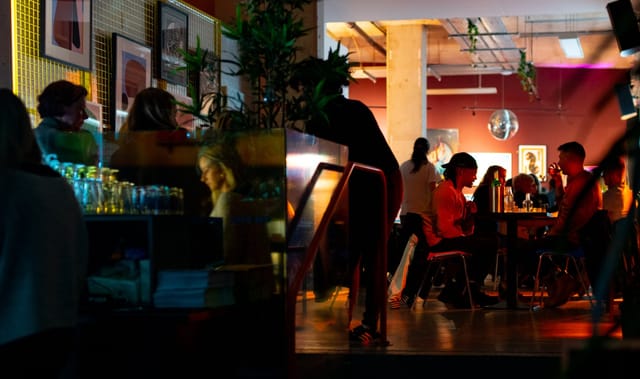 Private hire venue in Hen's Teeth with warm lighting, ideal for networking events.