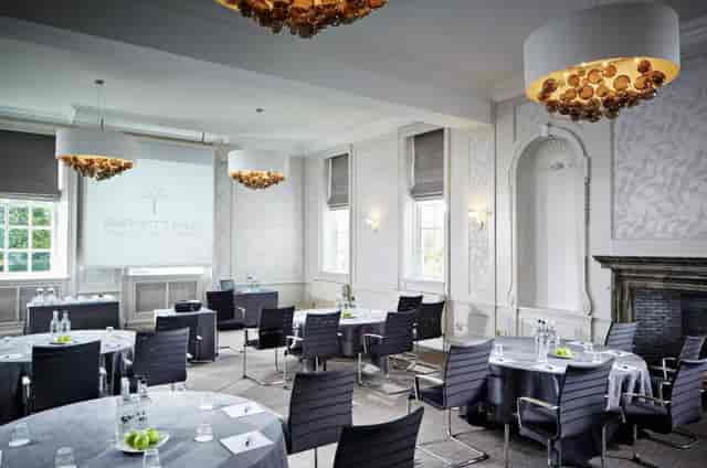 Elegant meeting room in Barnet Hill for workshops and presentations, featuring natural light.