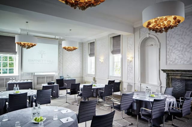 Elegant meeting room in Barnet Hill for workshops and presentations, featuring natural light.