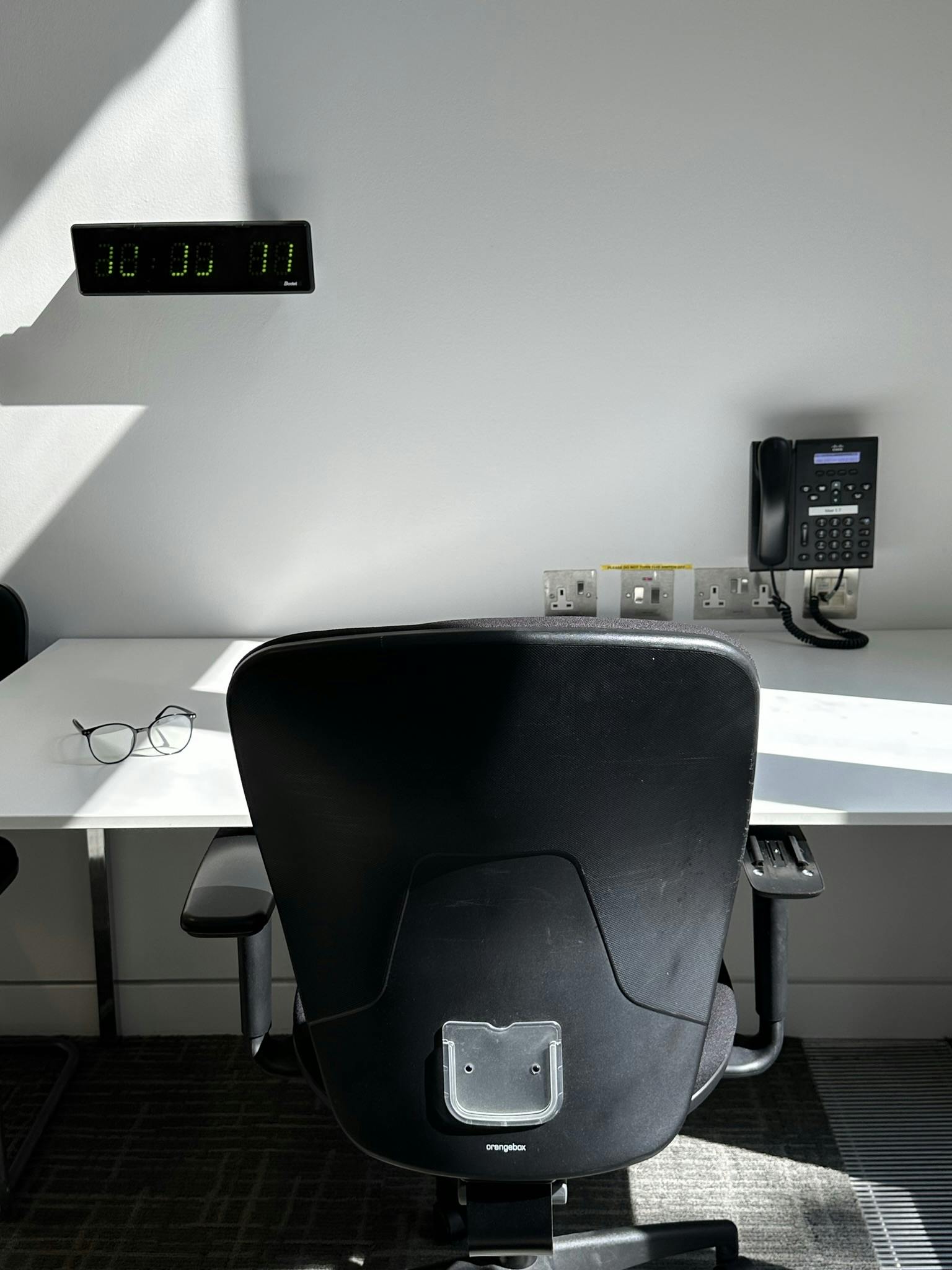 Minimalist workspace at Scenario Assessment Centre, ideal for meetings and brainstorming sessions.