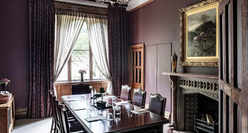 Elegant meeting room in Nuffield Priory, perfect for corporate events and discussions.