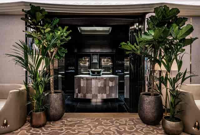 Elegant entrance to The River Restaurant by Gordon Ramsay, perfect for corporate events.