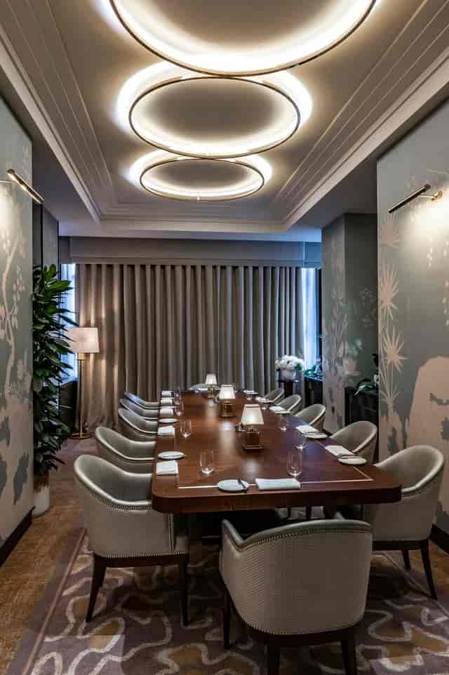 Private room at The River Restaurant, elegant table setup for corporate meetings and private dinners.
