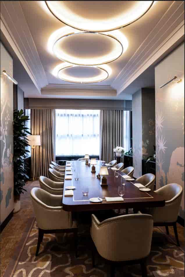 Private meeting room at The River Restaurant, elegant table setting for corporate events.