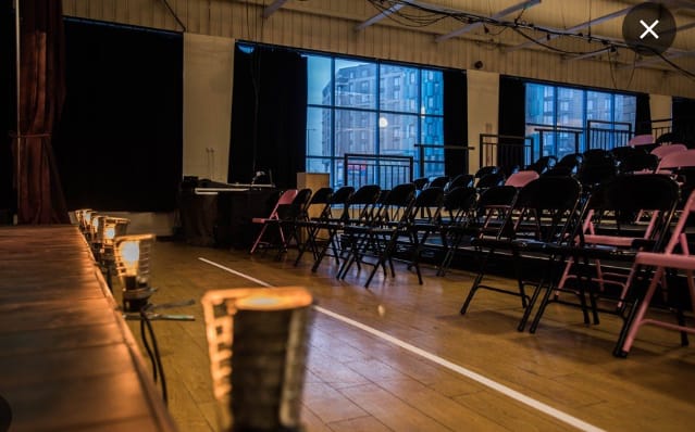 Leadenhall Street Studio event space with black and pink chairs for stylish presentations.