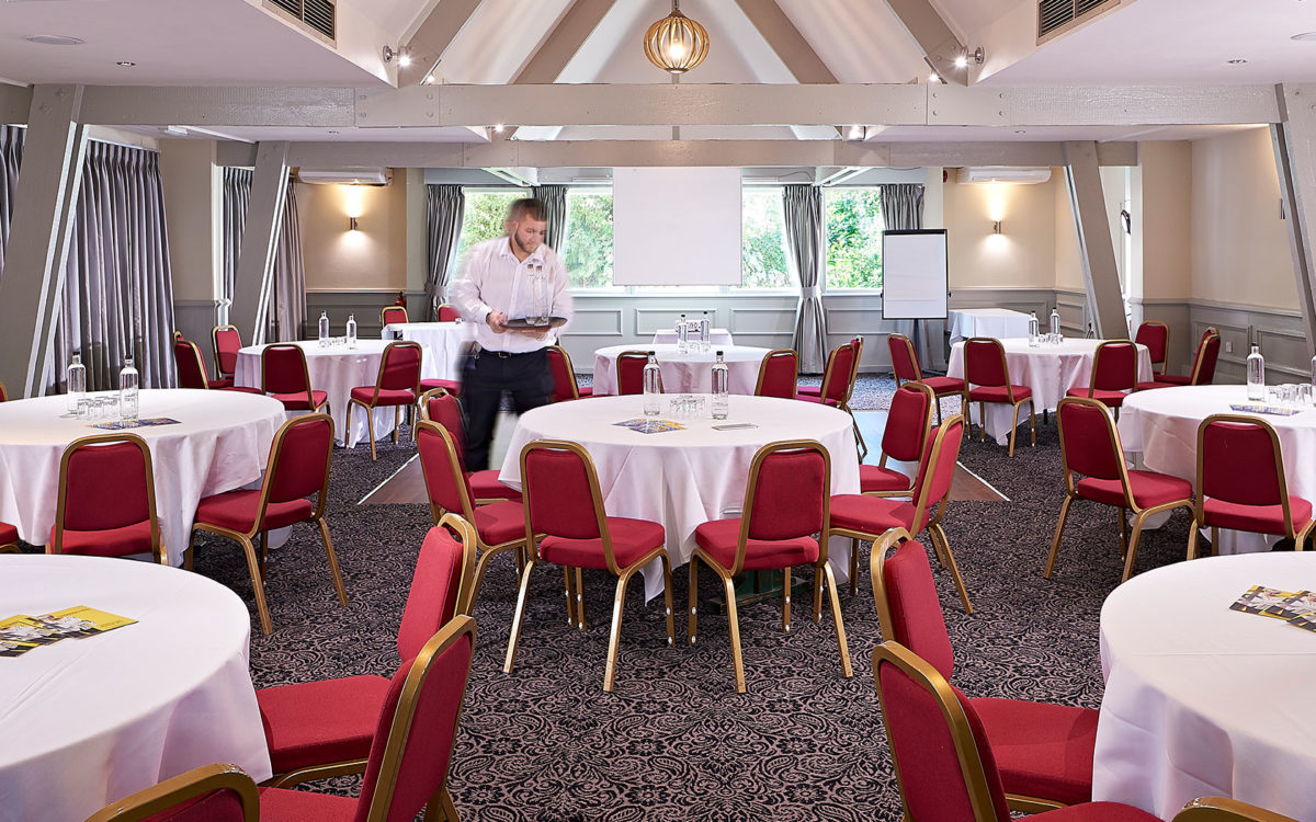 The Garden Room at Potters Heron Hotel, ideal for workshops and conferences. - Banner