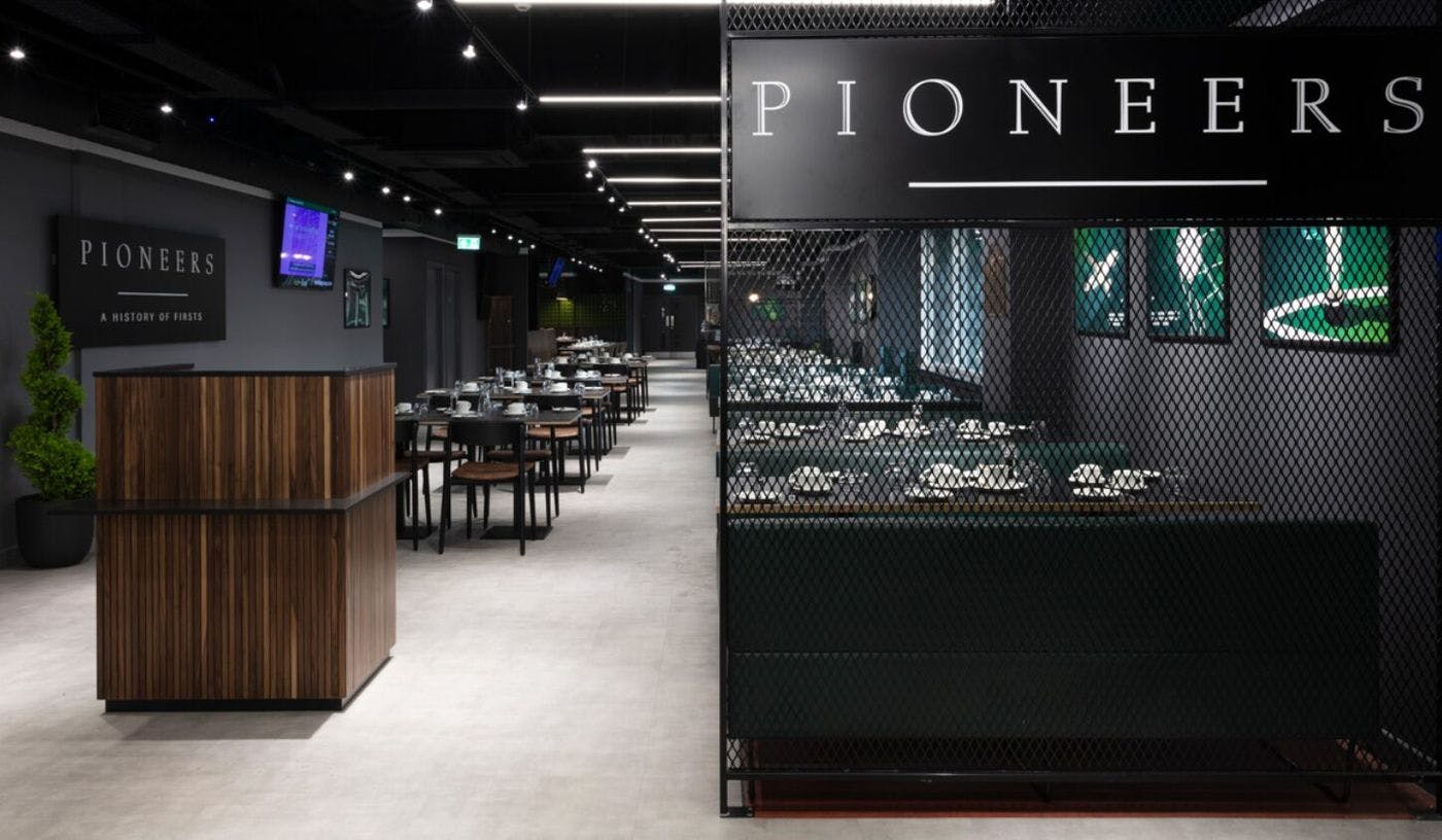 Modern dining space at Hibernian FC for corporate events and upscale functions.