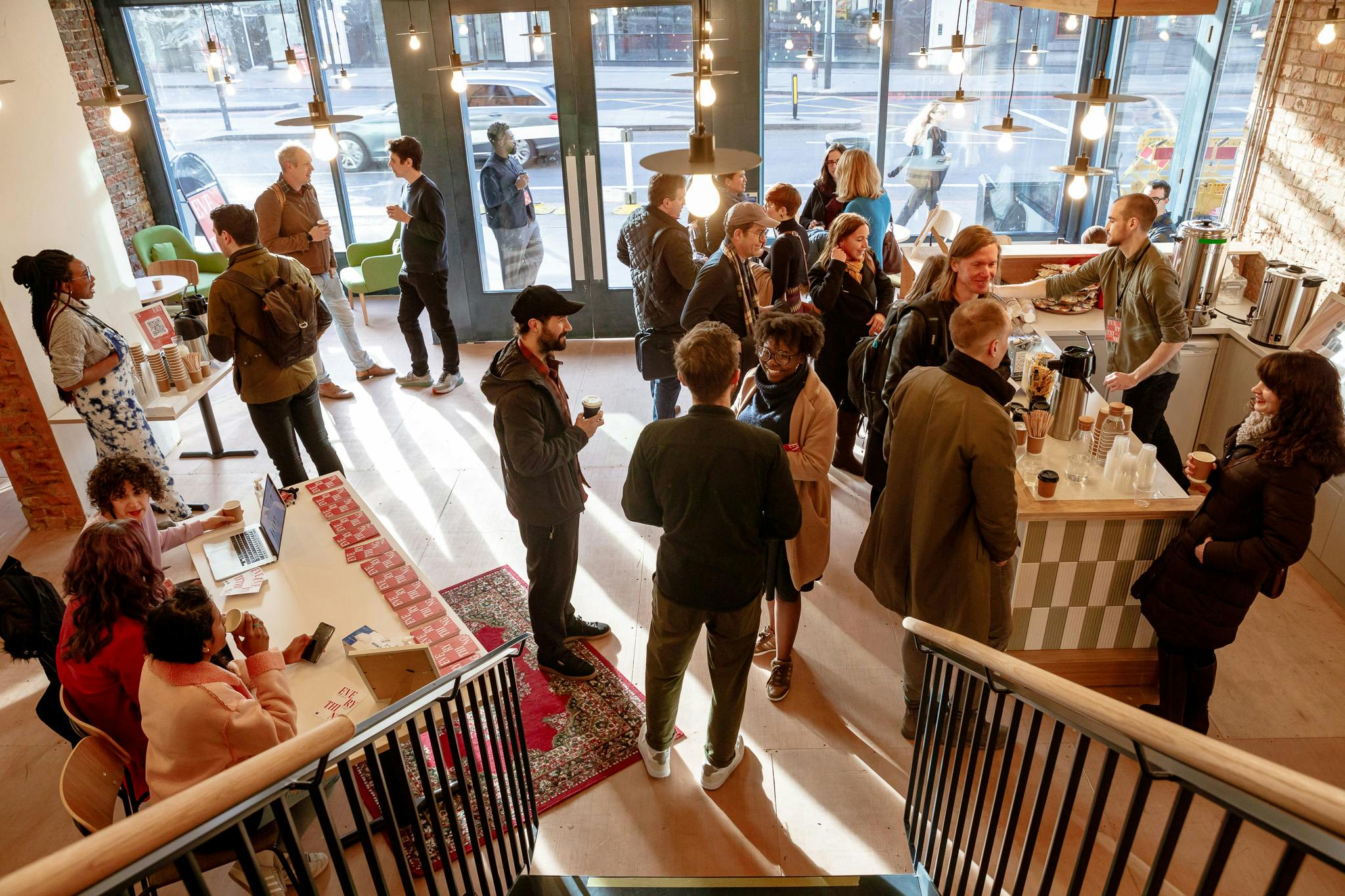 Networking event at King's House with vibrant decor and engaging conversations.
