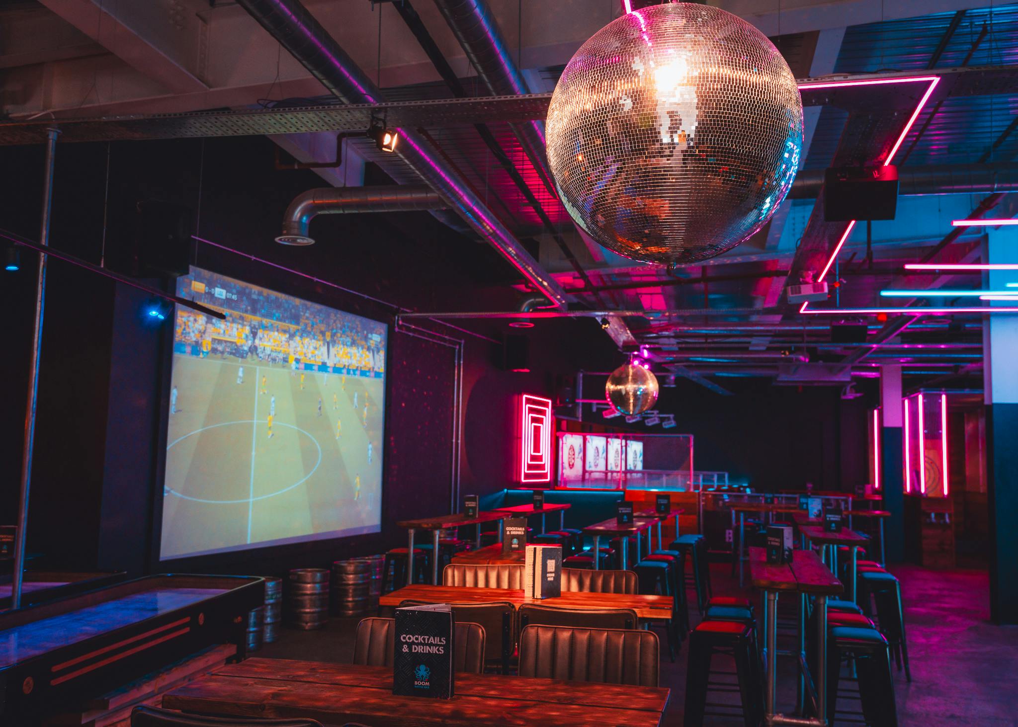 Party Packages at Boom Battle Bar Leeds with vibrant decor for corporate events and gatherings.