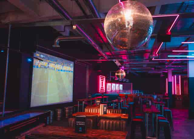 Party Packages at Boom Battle Bar Leeds with vibrant decor for corporate events and gatherings.