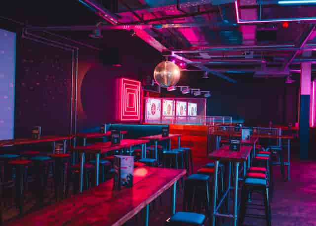 Vibrant event space with neon lights for lively parties in Boom Battle Bar Leeds.