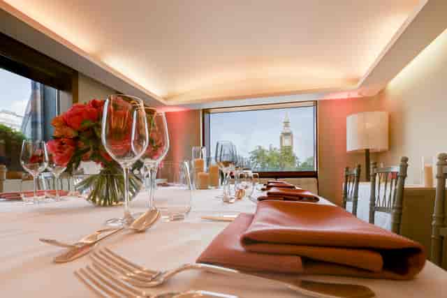 Elegant dining table in President's Dining Room with Big Ben view for corporate events.