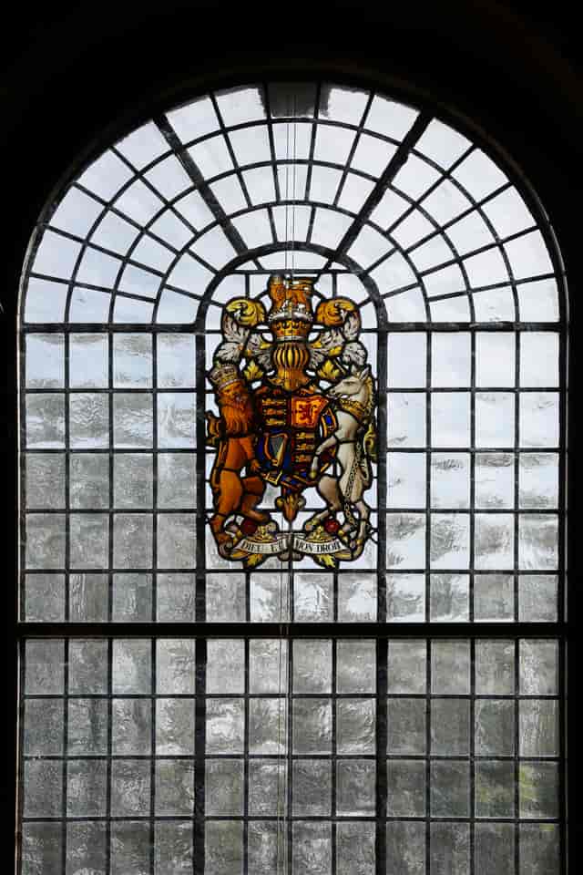 Stained glass window in Lecture Hall, perfect for formal events and gatherings.
