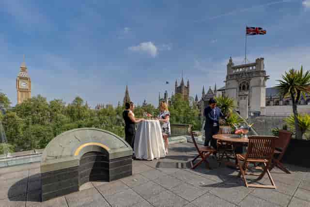Rooftop event space at Terrace, featuring views of Big Ben and elegant cocktail setup.