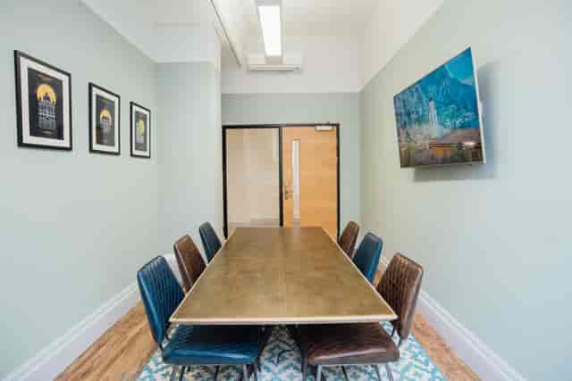 Kirkgate Suite meeting room with sleek table, ideal for corporate events and presentations.